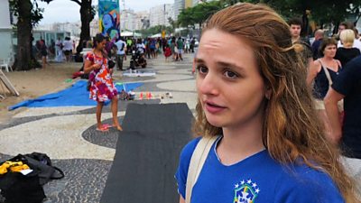 A young woman wearing a Brazil football shirt in Rio De Janeiro