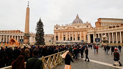 Mourners queue to see former Pope lying in state at the Vatican