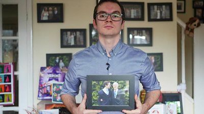 Steve Parsons holding photo of grandfather