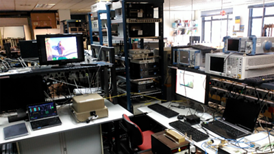 A room with various pieces of test equipment 