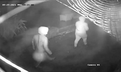 CCTV footage of two hooded men