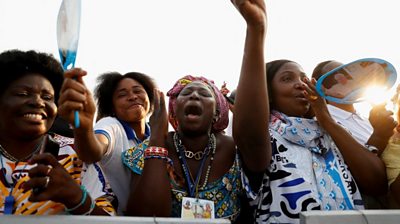People gather as Pope Francis celebrates a mass during his apostolic journey, in Kinshasa