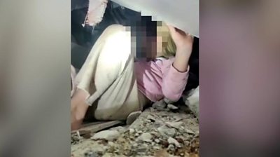 Girl rescued from rubble