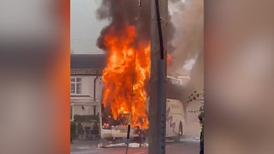 School bus on fire in Trimley St Mary
