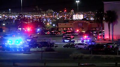 Police cars surround mall after mass shooting