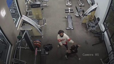 Woman flees man in gym