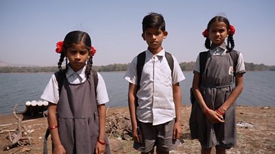 Three students in a small Indian town had to travel on a rickety boat to reach school everyday.