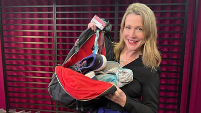 Entertainment reporter Sophie van Brugen holds an open bag with various items