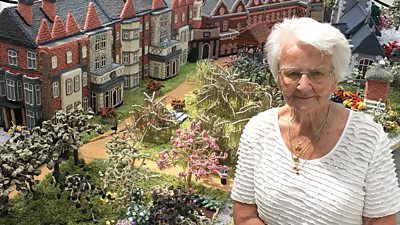 Margaret Seaman with her knitted version of Sandringham House