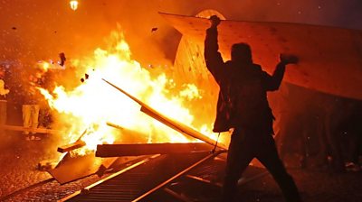 Protesters set fire to construction equipment in Paris