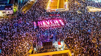 An aerial view shows people protesting in Tel Aviv