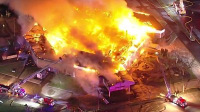 Huge fire engulfs church as firefighters try and put it out