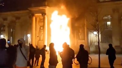 Door of Bordeaux City Hall in flames
