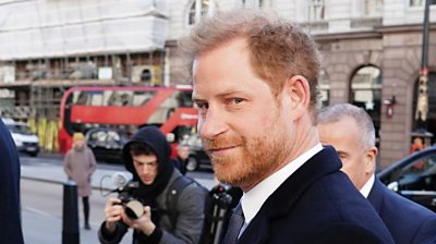 Prince Harry walking to court
