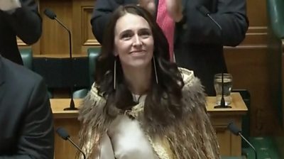 Jacinda Ardern smiling after last speech in parliament