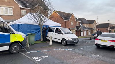 Van reverses into tent