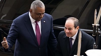 US Secretary of Defense Lloyd Austin greets Egyptian President Abdel Fattah El-Sisi