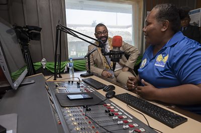 UK Foreign Secretary James Cleverly speaks in studio to a Solomon Islands radio presenter during a visit