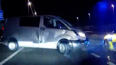 Grey van smashed on the Severn Bridge alongside a police car