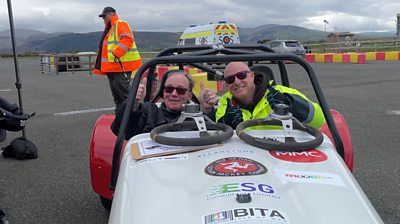 Roger Ingrey and Andy Bevan in a car on the race track