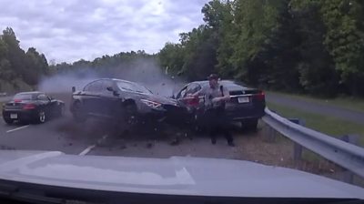 Police officer runs from speeding vehicle on highway