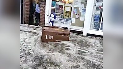 A newsagent says heavy rain brought the worst flooding he has seen in 17 years.