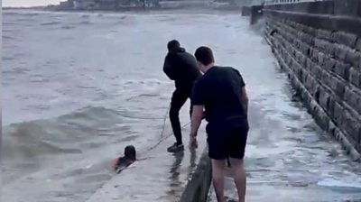 Passerby on moment Bridlington heroes rescued girl from sea - BBC News