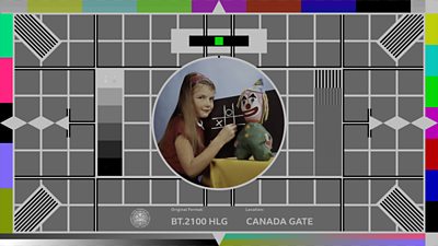 Testcard UHD, a variation on the famous test card F with a little girl and a doll at the centre