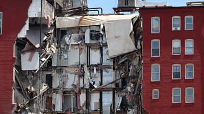 Iowa building collapse: 'We believe he's under the rubble' - BBC News