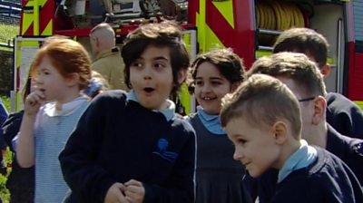 From the Royal Navy to the fire service, pupils at a Belfast primary school take part in a careers day.