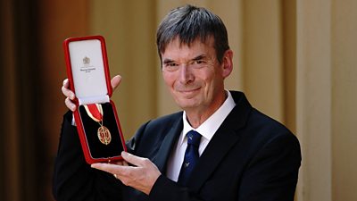 Ian Rankin photographed outside Buckingham Palace in London