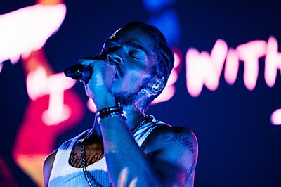 Bosco (MALCOLM KAMULETE) in Champion (Credit: BBC/New Pictures Ltd/Ben Gregory-Ring)