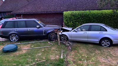 Video footage shows cars narrowly missing a house near a new road built to bypass HS2 work.