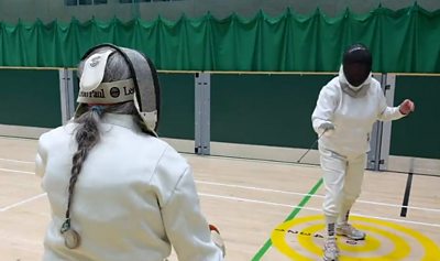 Fencers in action