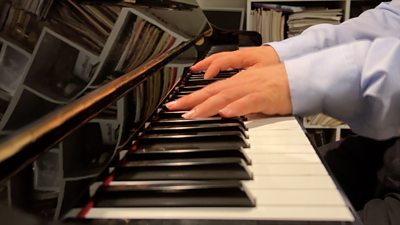 hands on a piano