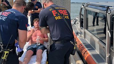 Florida: Man rescued from partially sunken boat after 24 hours at sea