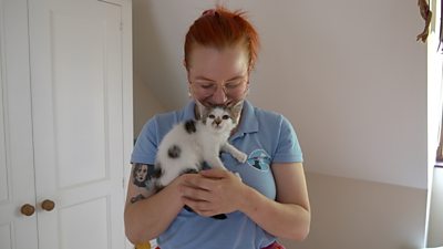 Lauren Sheldrick with a kitten