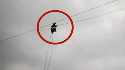 Person laying new cable line in Pakistan