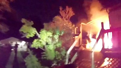 Fire on the porch of a house