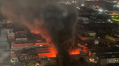 Smoke rises from a burning building amid a deadly fire, in Johannesburg, South Africa, August 31, 2023