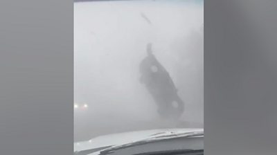 A car is flipped by the strong winds in a South Carolina highway as hurricane Idalia was passing through the state