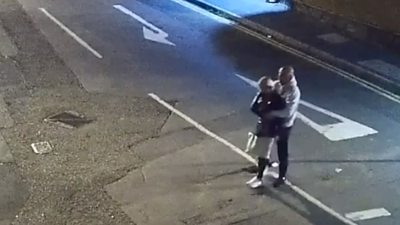 CCTV shows a woman looking unsteady after a struggle with her estranged husband.