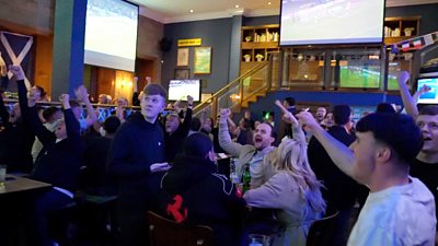 Fans in a Glasgow pub