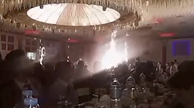 Inside the banquet hall as the fireworks go off