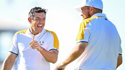 Rory McIlroy and Shane Lowry share a joke during Ryder Cup practice