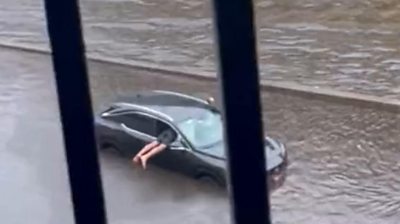 Person in a flooded car