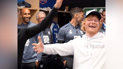 Ipswich Town Football Club players sing to Ed Sheeran in dressing room.