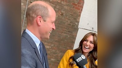 Prince William and Kate Middleton laughing when talking about their favourtite emoji during Radio 1 interview