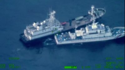 Aerial footage of a Chinese militia vessel bumping into a Philippine coast guard ship