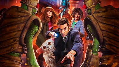 The Fourteenth Doctor, Donna Noble, Rose Noble and Beep the Meep are pictured. They're approached by two armoured green alien foes. doctor who 60th anniversary